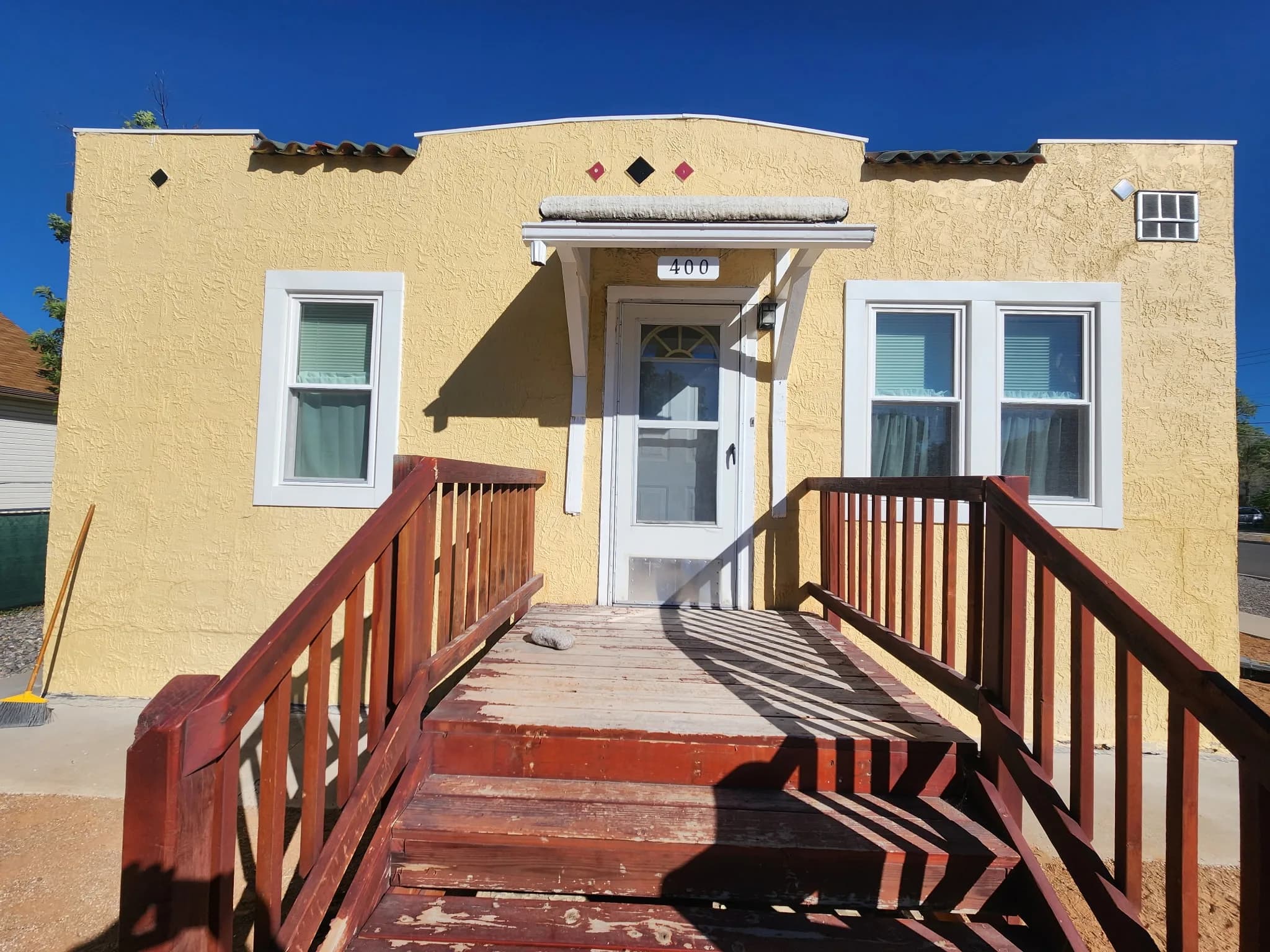 Windows on a southwestern stucco home exterior in Western Colorado