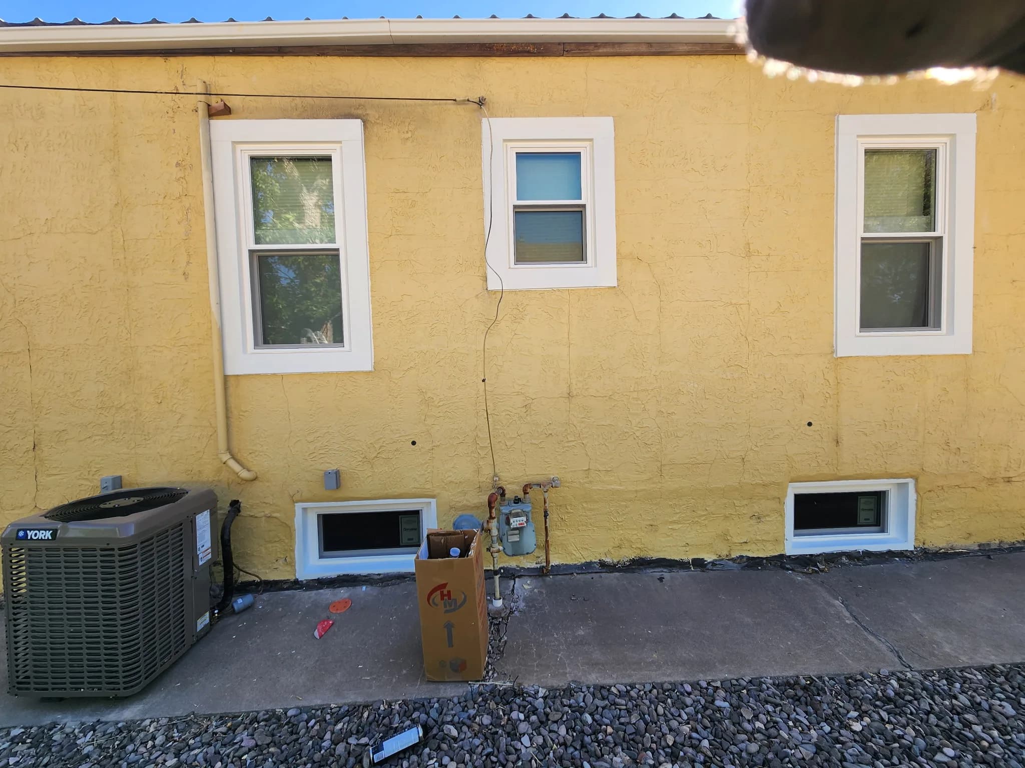 Commercial exterior windows installed on stucco building, showing storefront window installation in Western Colorado